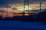 Train passing by at the sunset